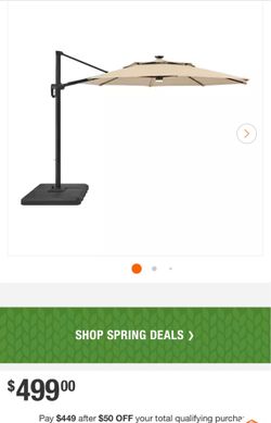 Hampton Bay 11ft umbrella $500 umbrella/ solar panel is broke and a couple scratches