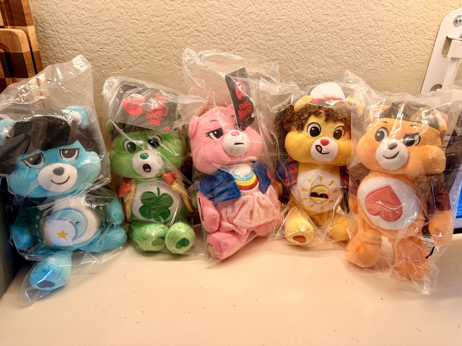 Brand new never opened with tags Care Bears x stranger things plushies full set