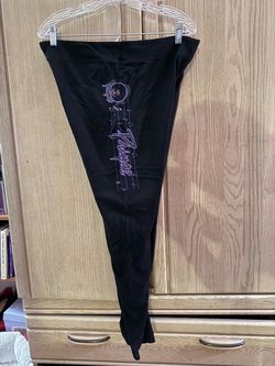 Prince leggings with picture of Prince and his name down side of leg.