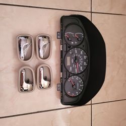 Speedometer & Handles Mazda Protege 1(contact info removed)