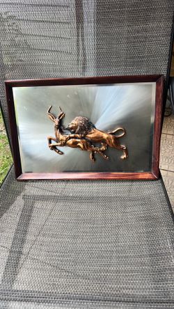 This vintage South African 3D relief art piece is likely by John Louw and features a lion attacking an antelope.