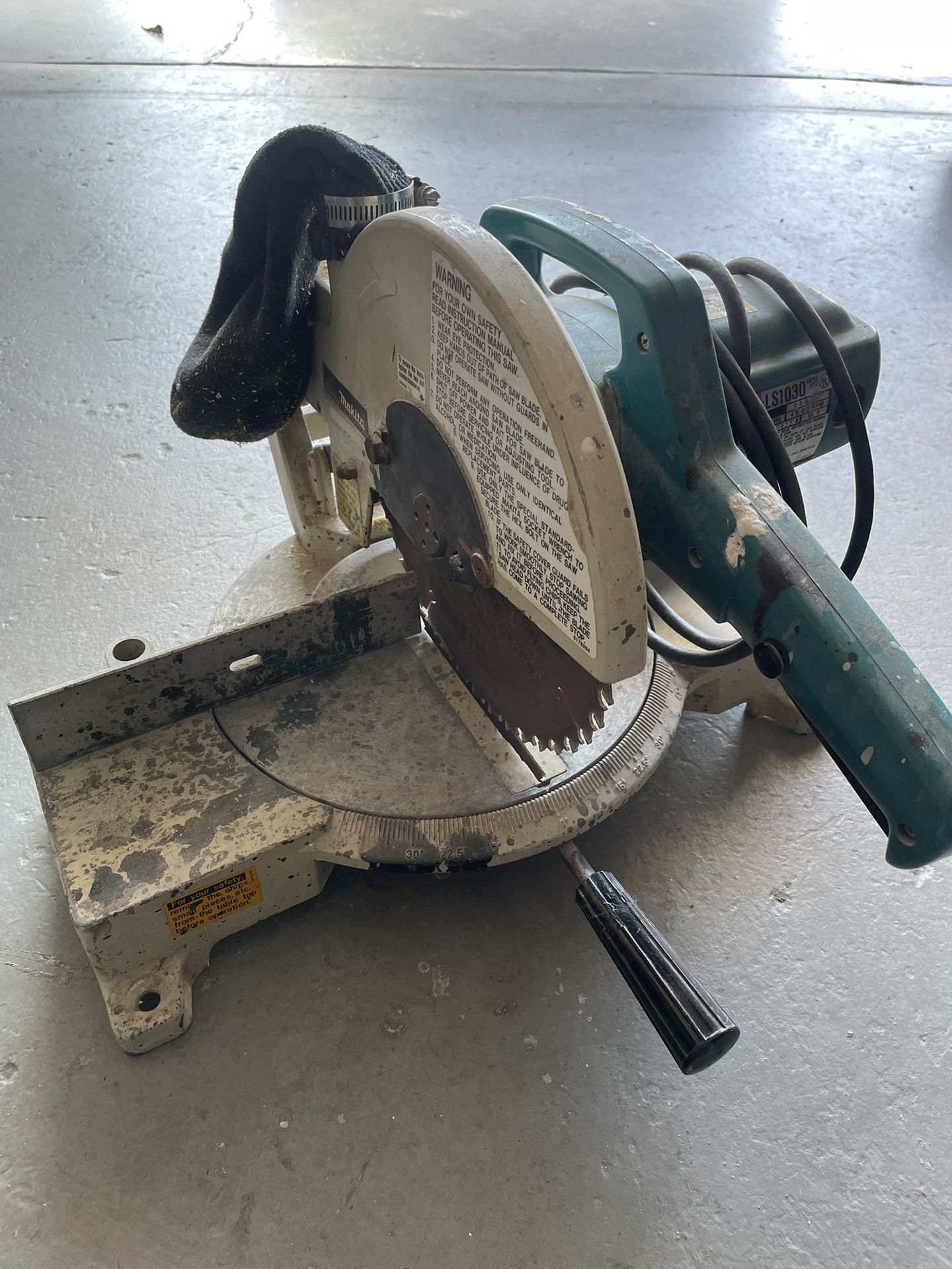 Makita miter saw with Stucco and Joint compound