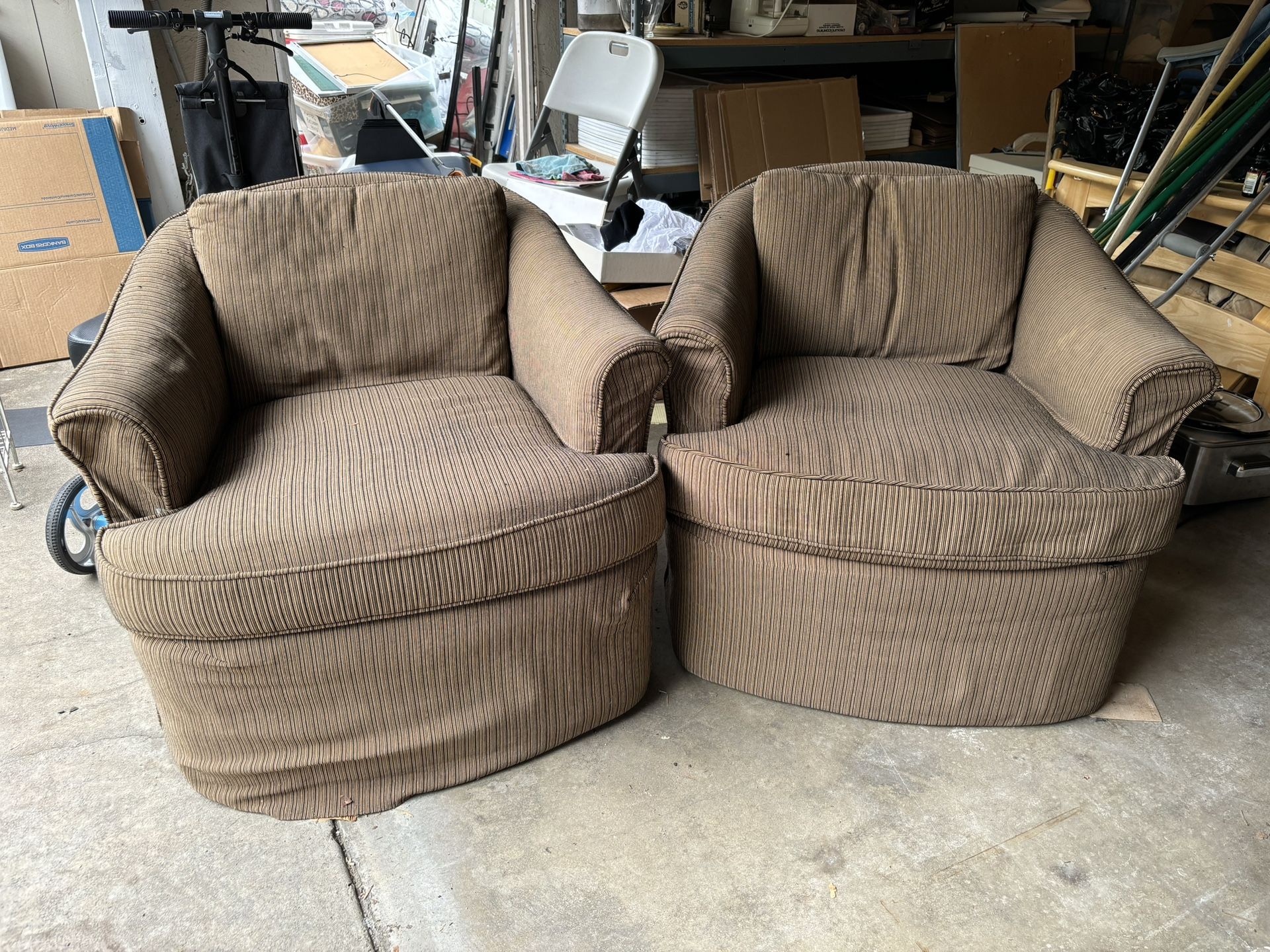 2 Fabric Covered Swivel Chairs