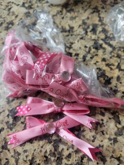 12 Pieces ribbons with "It's a Girl" text, Placex on baby shower favors.