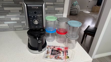 Like New Ninja CREAMi 11-in-1 Ice Cream Maker  with 6 containers and booklets