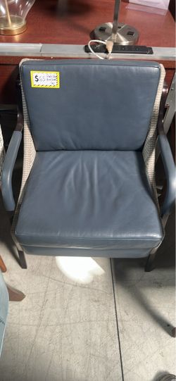 Blue Cushioned Armchair with Woven Frame