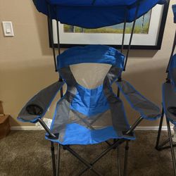 Two brand new alpha camp folding chairs with shade a 