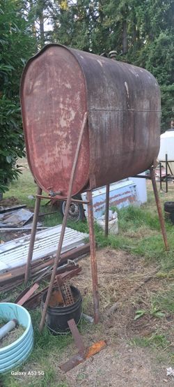2 Large Steel Containers/tanks 1 Plastic