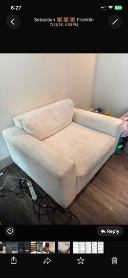 Oversized link swivel arm chair