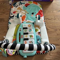 Fisher-Price Glow and Grow Kick & Play Piano Gym Baby Playmat with Musical Learning Toy