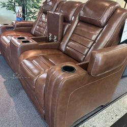 The Man-Den Gray Power Reclining Sofa And Loveseat
Ashley Furniture $10 Down Payment Financing And Delivery