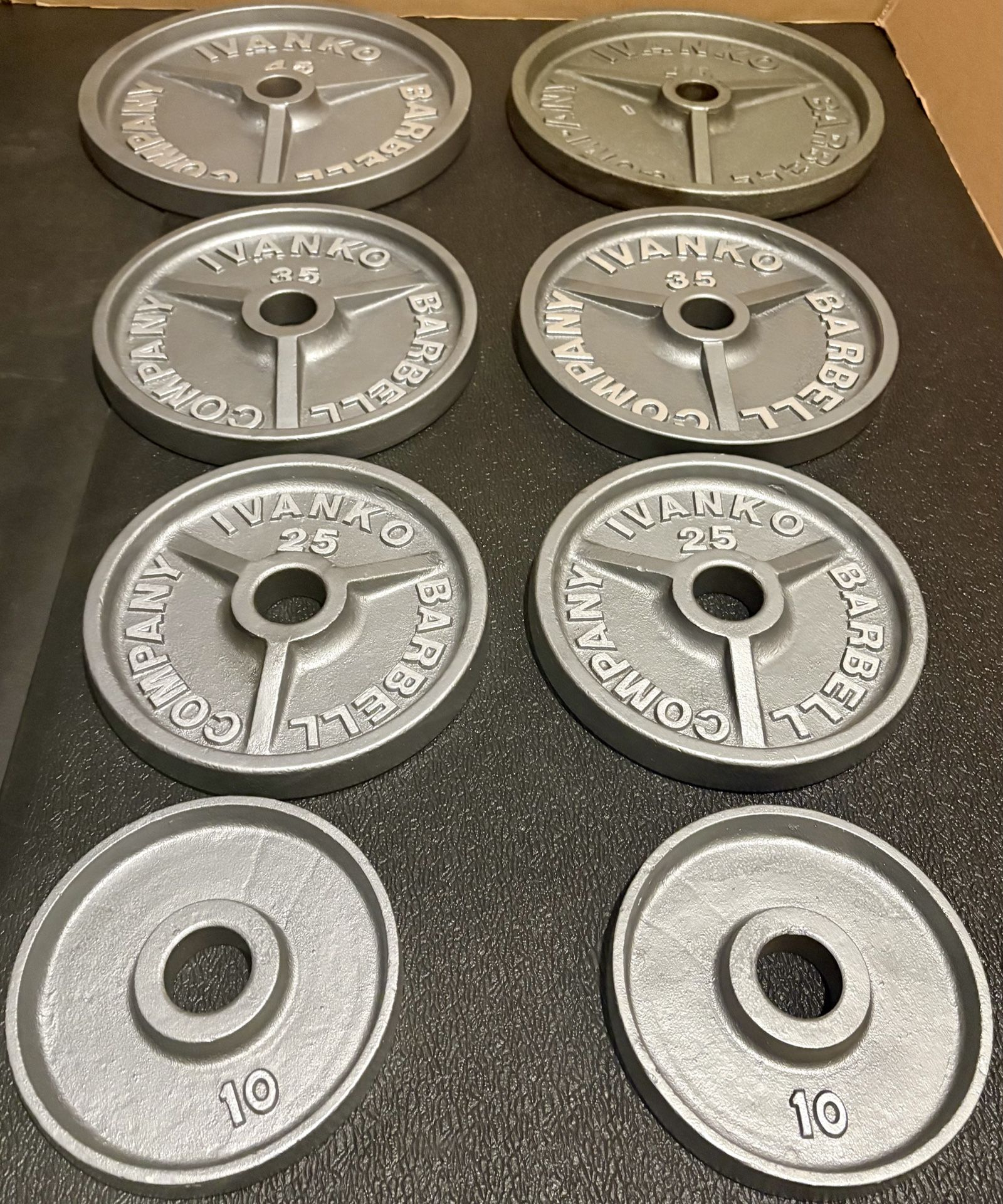 Set of Olympic Vintage IVANKO Weight Plates: Pairs of 45s, 35s, 25s and 10s. Reconditioned Total: 230 #