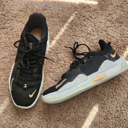 Nike Black and Gold Shoes