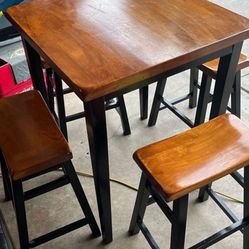 Table And 4 Barstools 