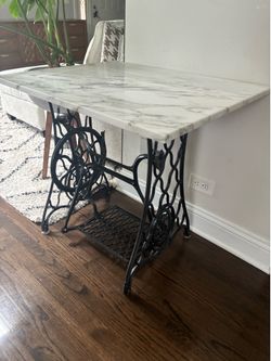 authentic vintage sewing machine base with marble top