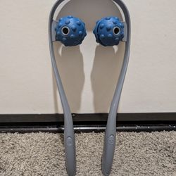 Neck and shoulder massager with rolling massage balls.