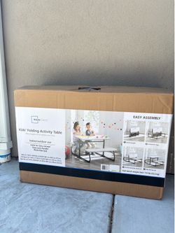 Kids folding activity table
