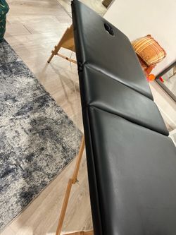 Massage table