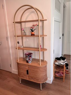 Flutted arched bookshelf