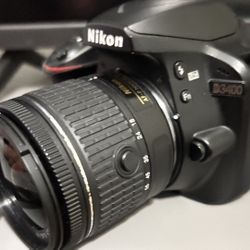 Nikon D3400 DSLR Camera Bundle – Lens, Bag, Charger, 2 Memory Cards
