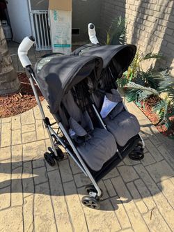 *New* EvenFlo Minno twin stroller $100obo