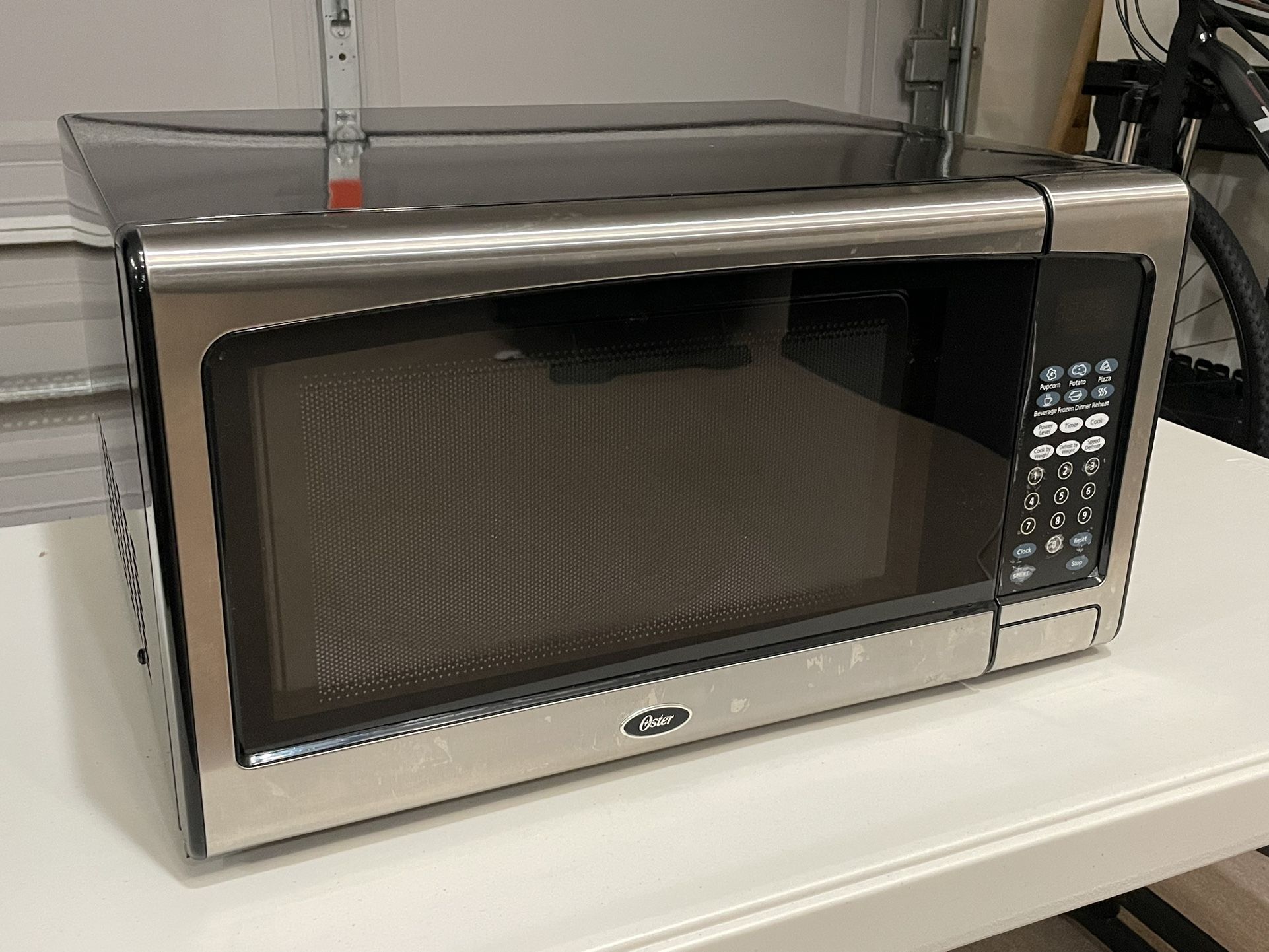 Oster 1.3-Cu.-Ft. Microwave (1000 watts)