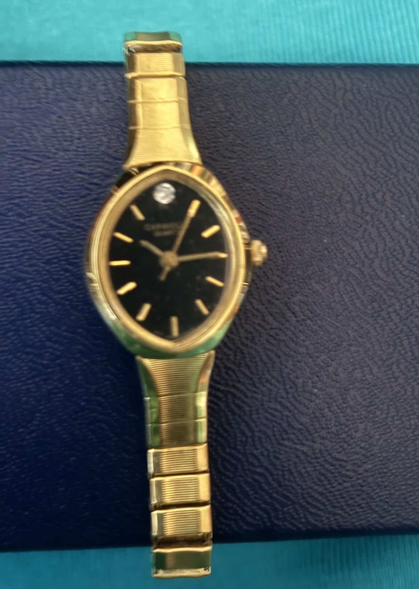 Elegant Gold Watch A Black Dial