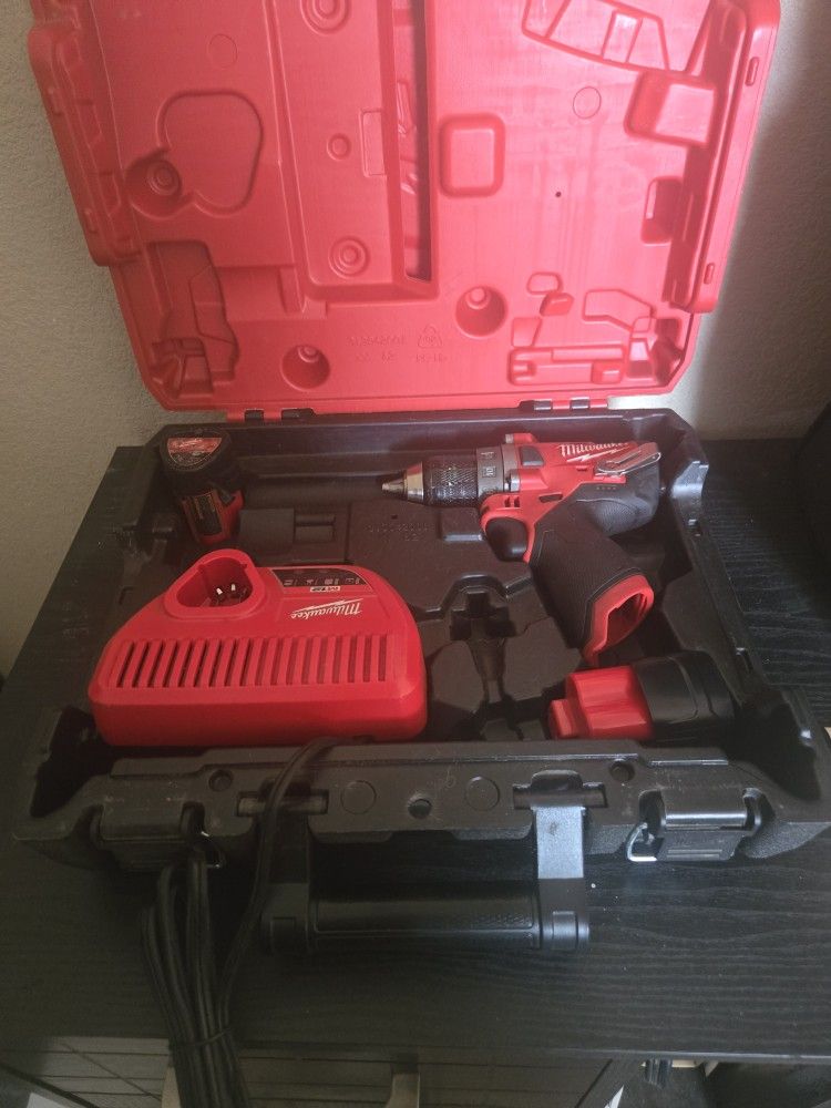Milwaukee Fuel Used 12v Hammer Drill With 2 Batteries