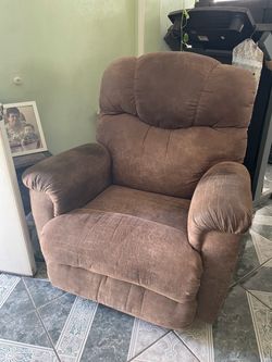 hand operated brown recliner