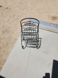 wrought iron magazine rack