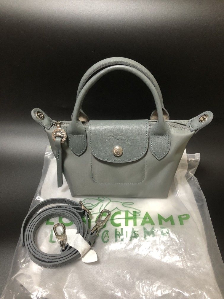 "LongChamp Le Pliage Neo Mini pouch with Shoulder Strap
"