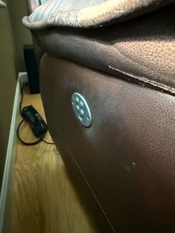 Two power recliners with power headrest