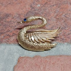 Vintage Gerry Gold Tone Swan Pin with Blue Crystal Eye