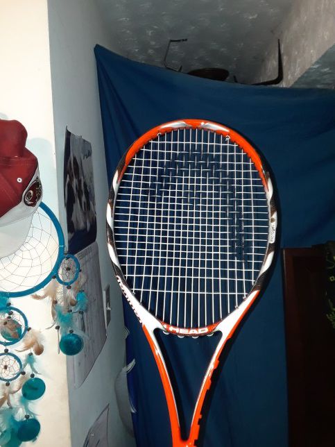 Lightweight tennis racquet