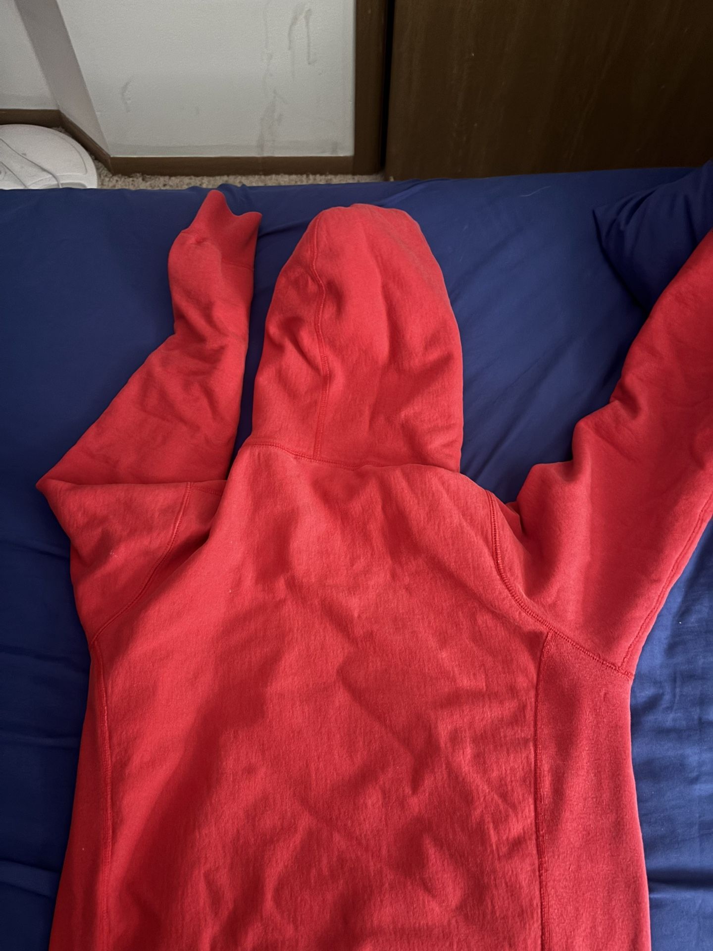 red supreme new york hoodie slightly worn