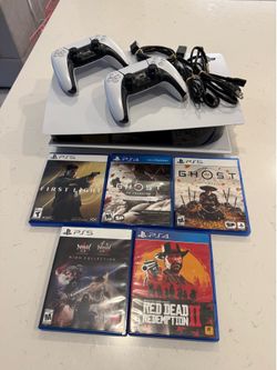PS5 + extra controller + 5 games