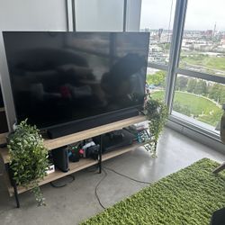 Tv, TV Stand, Soundbar W/ Surround Sound And WiFi router