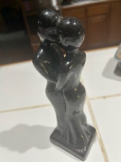 vintage Mid-Century Modern / Art Deco style black ceramic embracing couple figurine