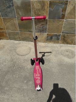 Pink child scooter