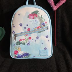 Disney ALICE IN WONDERLAND Mini Backpack 🎒 If Posted It’s Available ! Pls ONLY msg When Ready To Pu ! (PRICE IS FIRM)