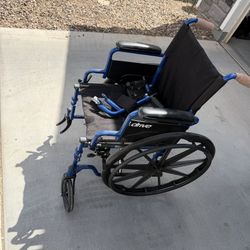 wheelchair (missing front wheel)