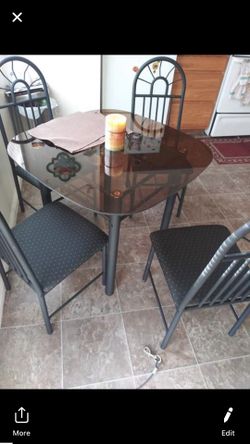 Glass tables new with 4 chairs