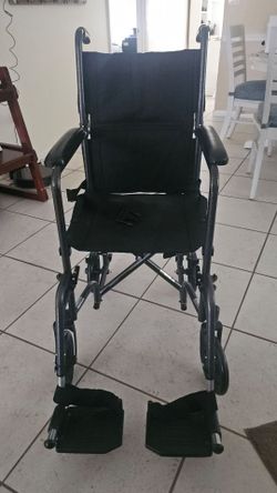 Drive Medical Lightweight Folding Transport Wheelchair - Reliable Mobility Support - Durable Steel Frame - Swing-Away Footrests - Compact Travel Desig