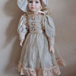 PORCELAIN COLLECTIBLE DOLL
