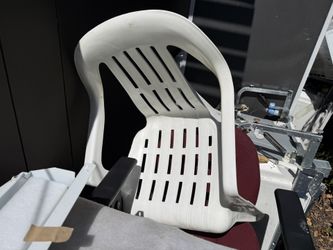 White plastic patio chair