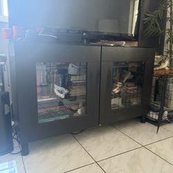 Old TV Stand With Shelves And Glass Windows.