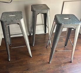 Three bar stools