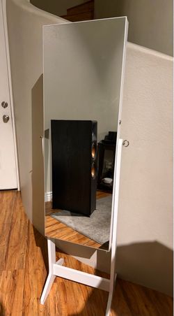 Jewelry cabinet mirror