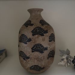 Handcrafted ceramic vase with turtle pattern
