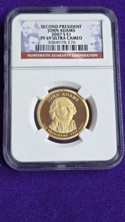 2007-S John Adams $1 Presidential Dollar coin graded PF 69 Ultra Cameo by Numismatic Guaranty Corporation (NGC). Sealed in original NGC slab.
